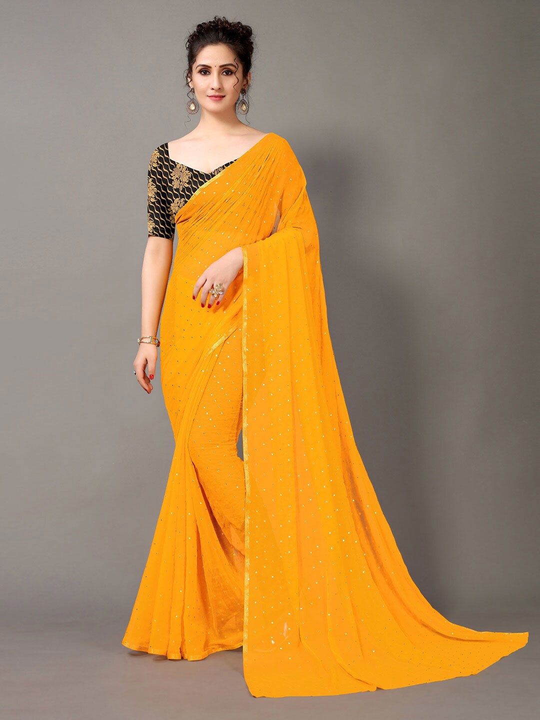 

HRITIKA Yellow & Gold-Toned Ethnic Motifs Saree