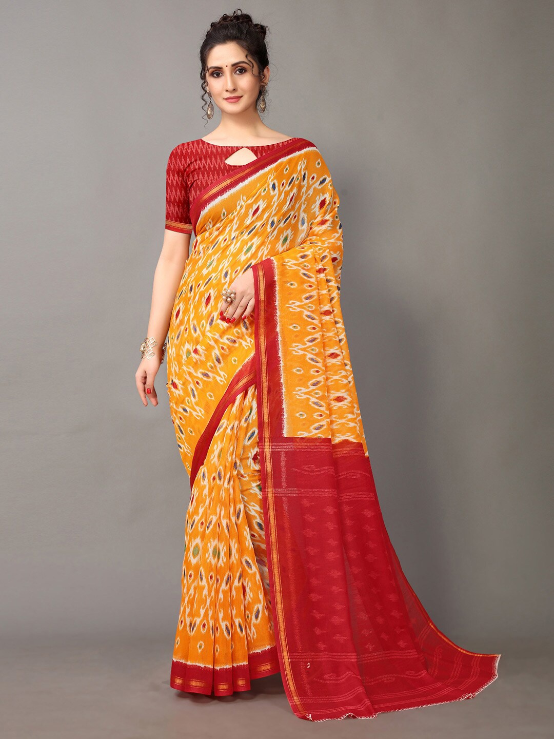 

HRITIKA Yellow & Red Cotton Blend Ikat Printed Saree
