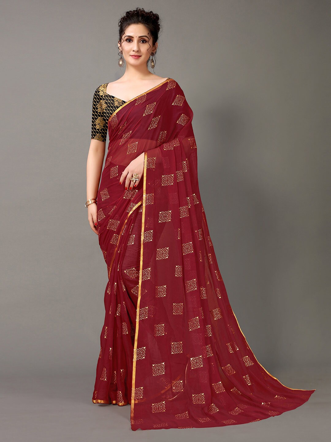 

HRITIKA Maroon & Gold-Toned Ethnic Motifs Saree