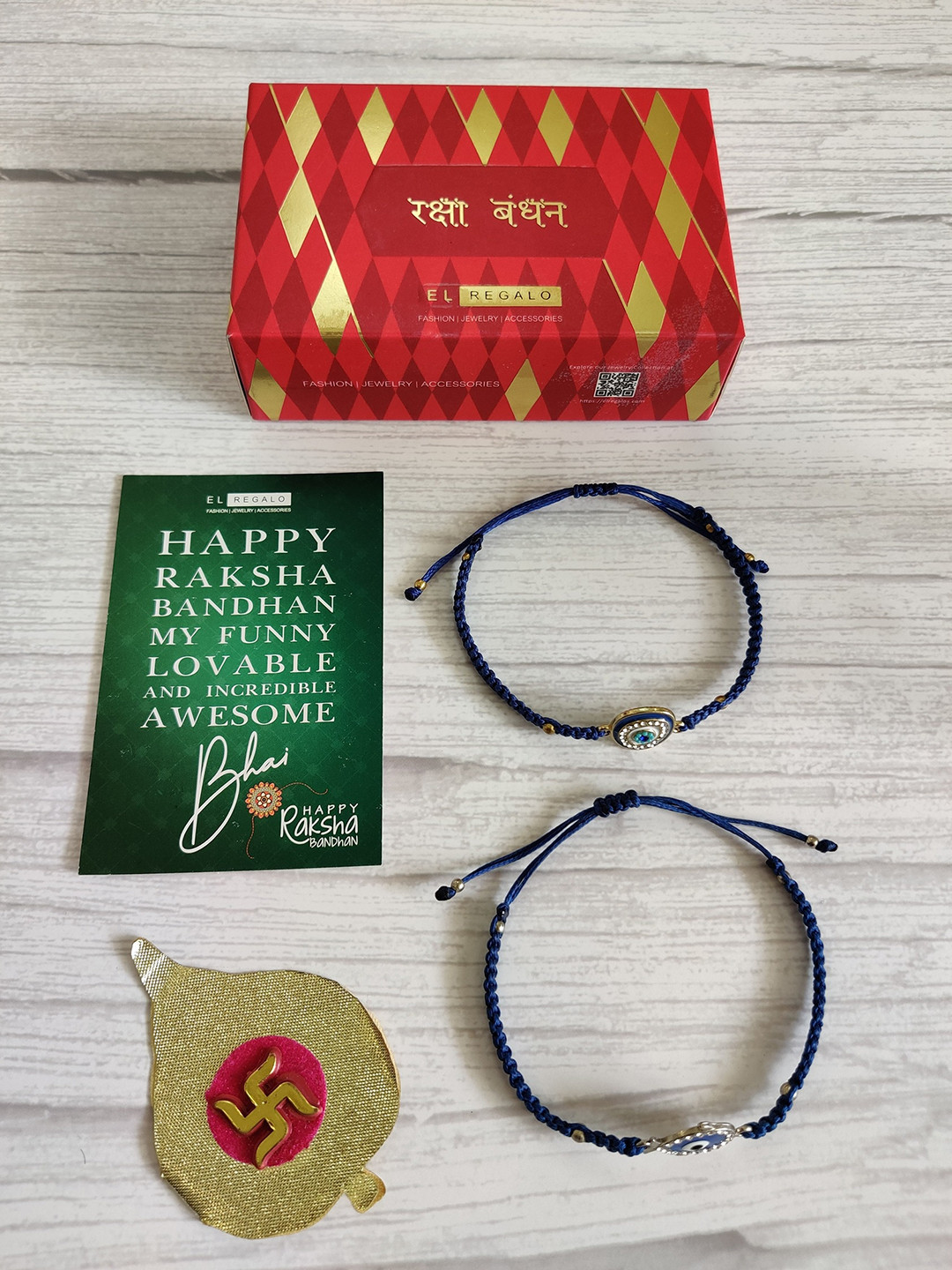 

EL REGALO Blue Set of 2 Evil Eye Rakhi with Roli Chawal & Greetings Card