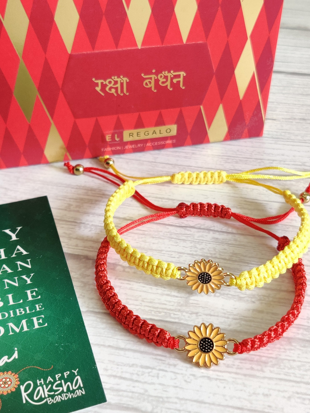 

EL REGALO Set Of 2 Yellow & Red Floral Rakhis