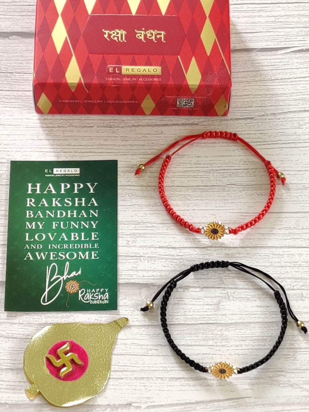 

EL REGALO Set of 2 Red & Black Evil Eye Rakhis with Roli Chawal & Greetings Card