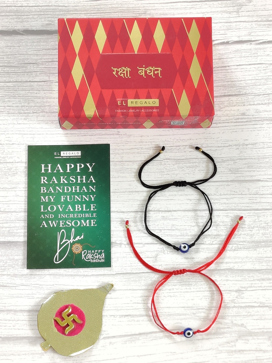 

EL REGALO Set Of 2 Red & Black Evil Eye Wrap Around Rakhi With Roli Chawal & Raksha Bandhan Greeting Card