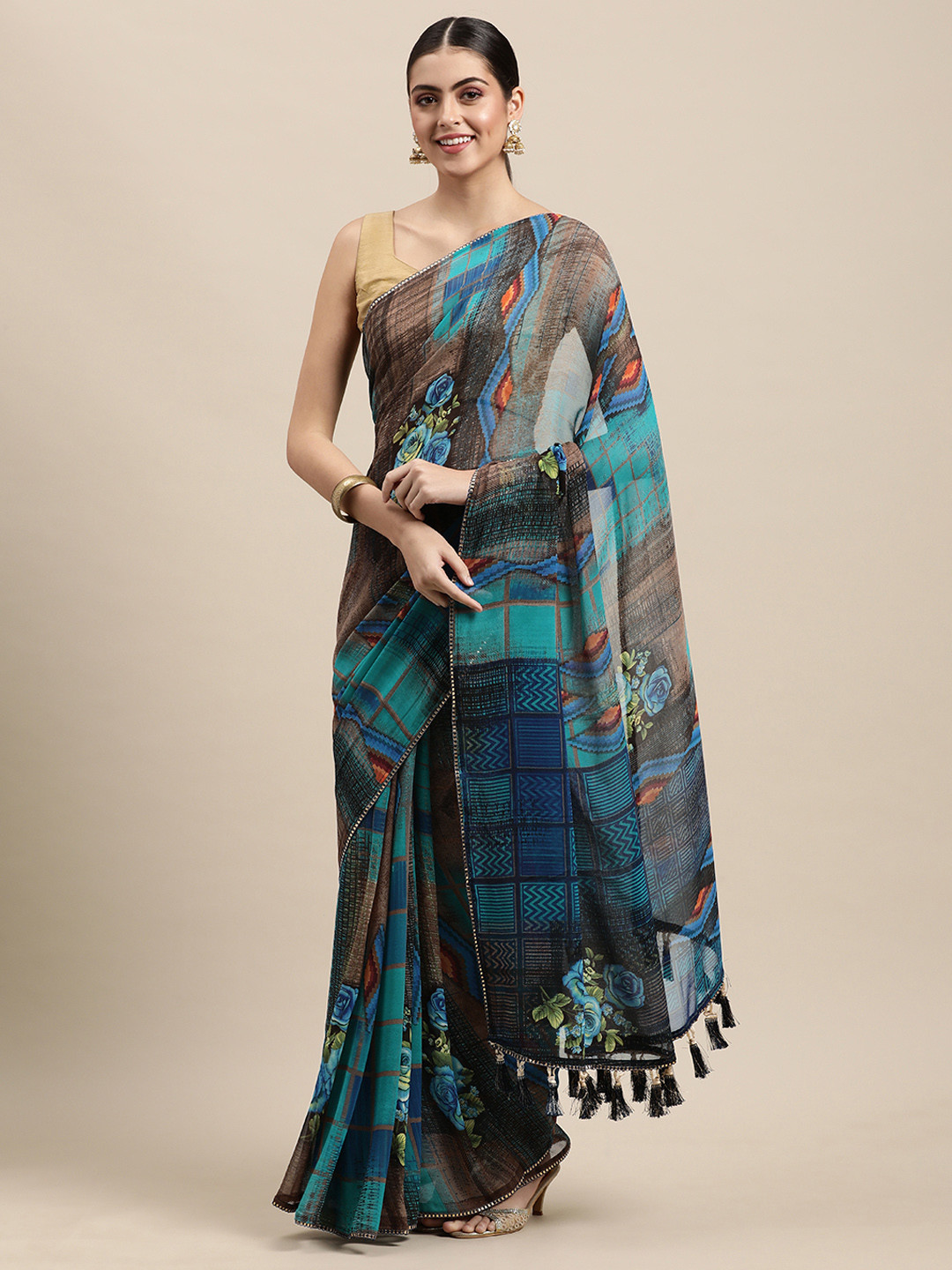 

Mitera Teal & Brown Pure Georgette Saree