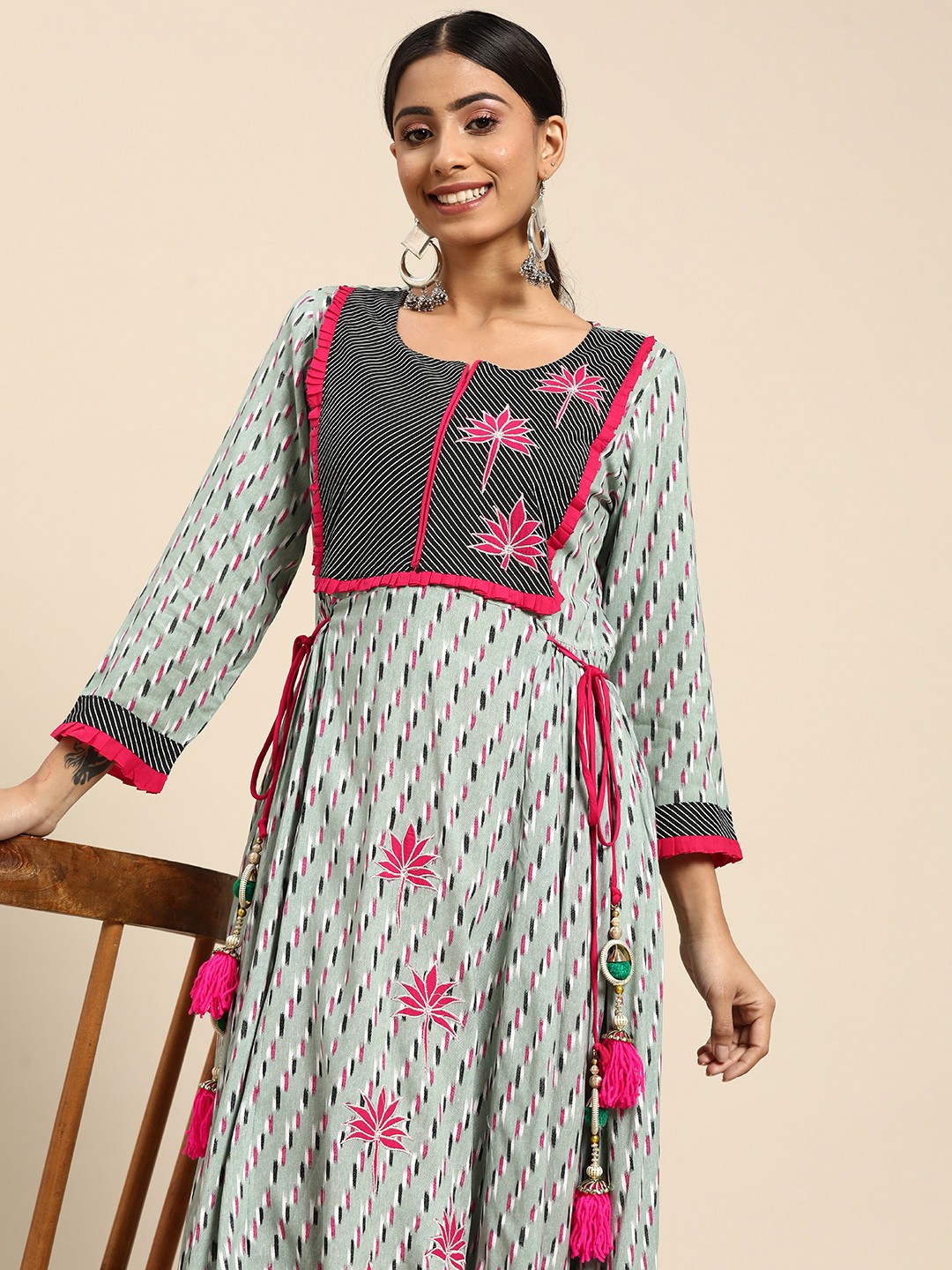 

Sangria Women Fuchsia Pink & Green Ethnic Motifs Printed Embroidered Tassels Kurta