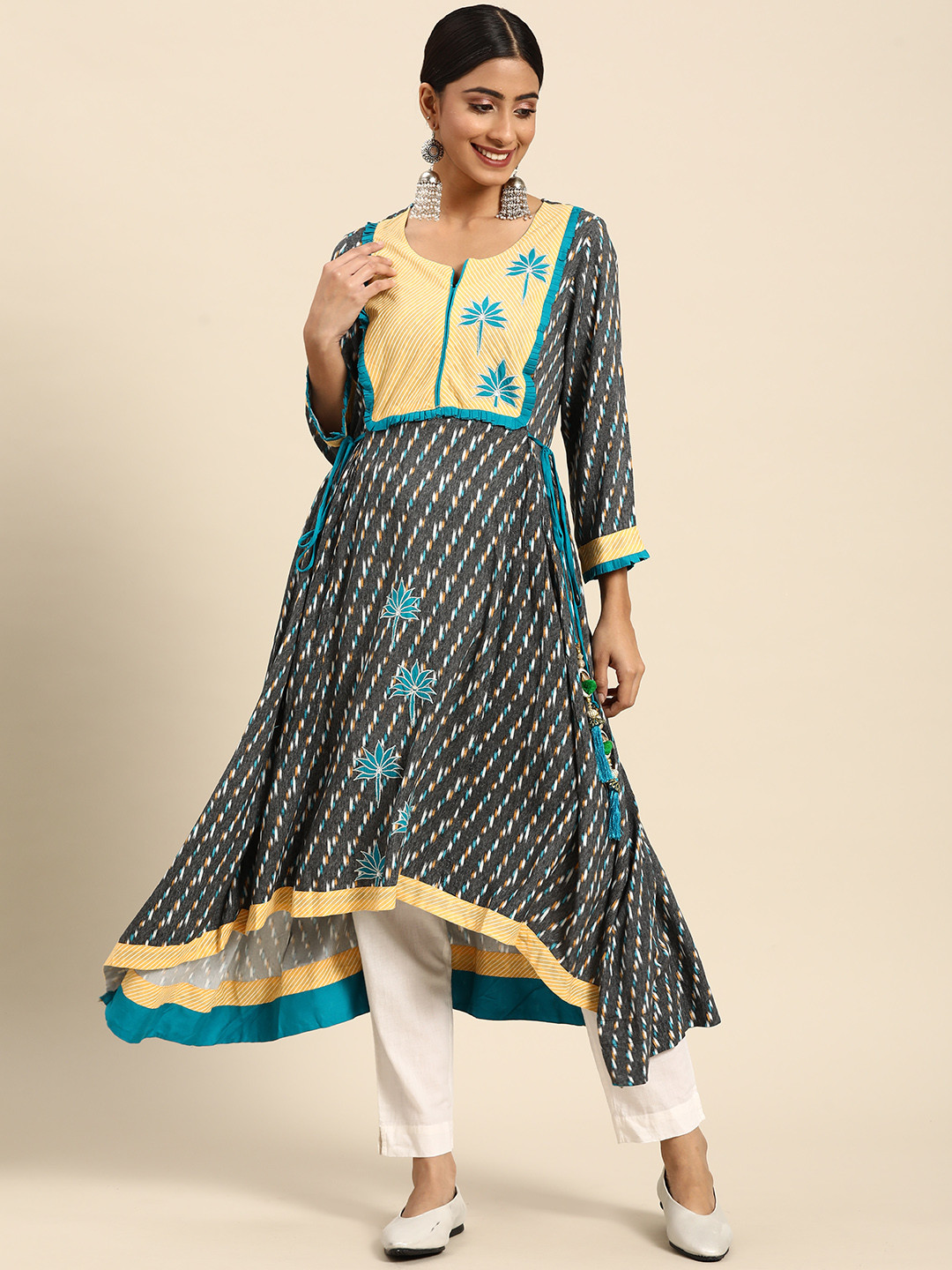 

Sangria Women Turquoise Blue & Black Ethnic Motifs Printed Embroidered Tassels Kurta