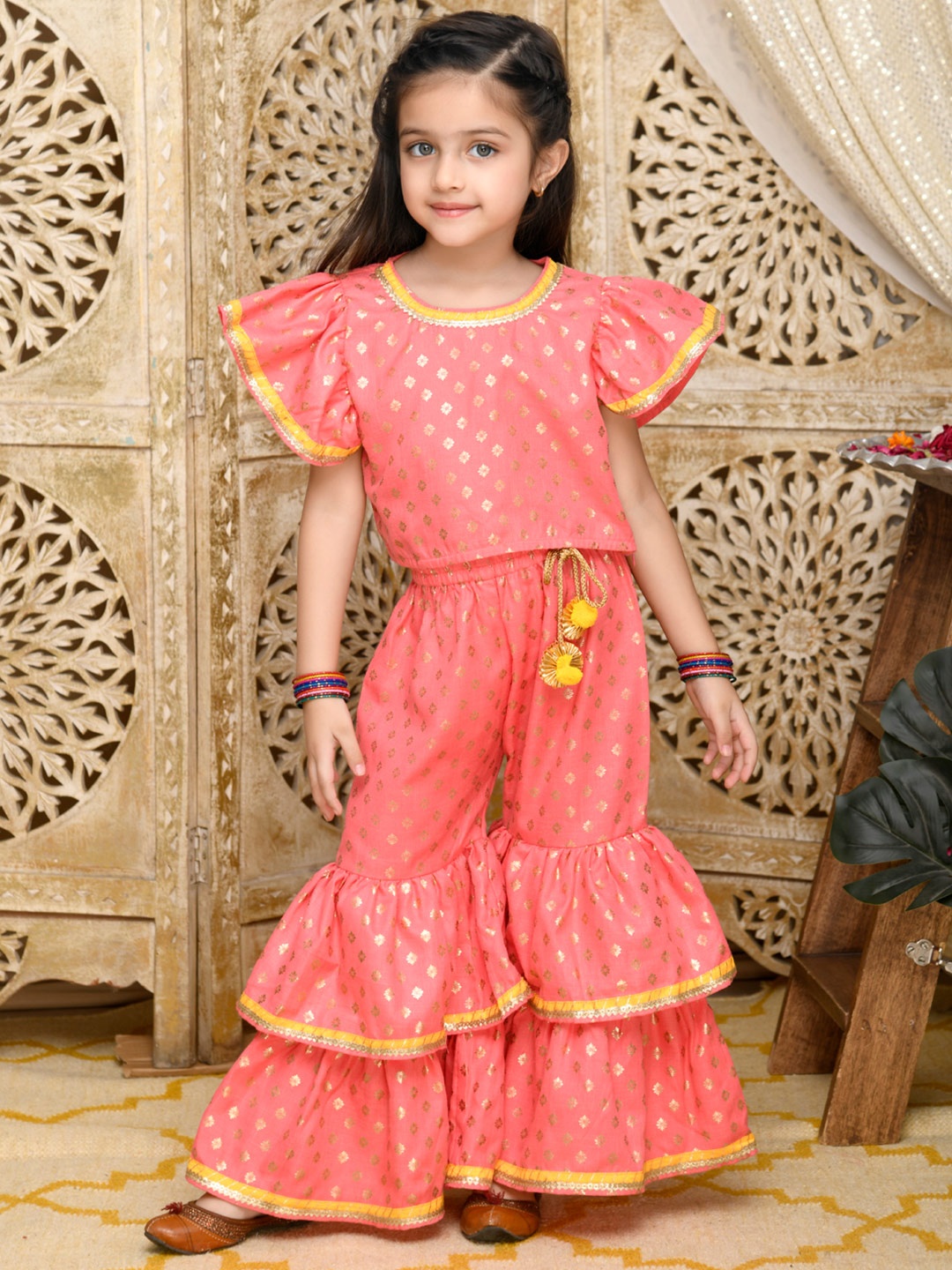 

SAKA DESIGNS Girls Peach-Coloured Floral Embroidered Tiered Kurti with Sharara & With Dupatta