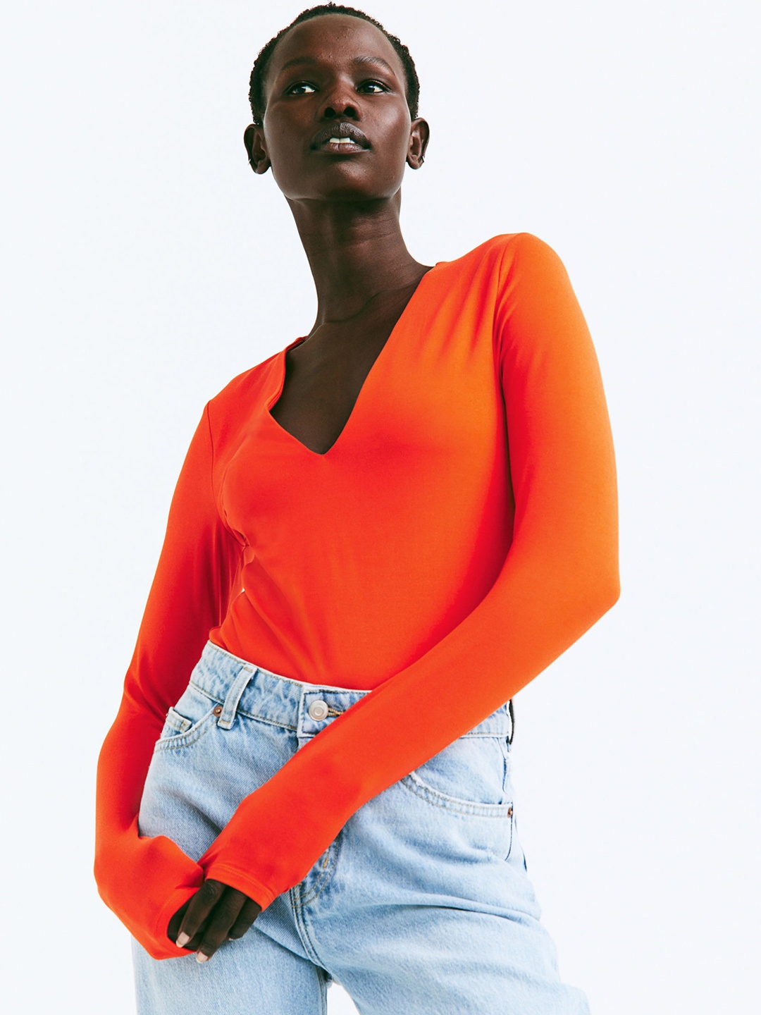 

H&M Women Orange Solid V-Neck Bodysuit