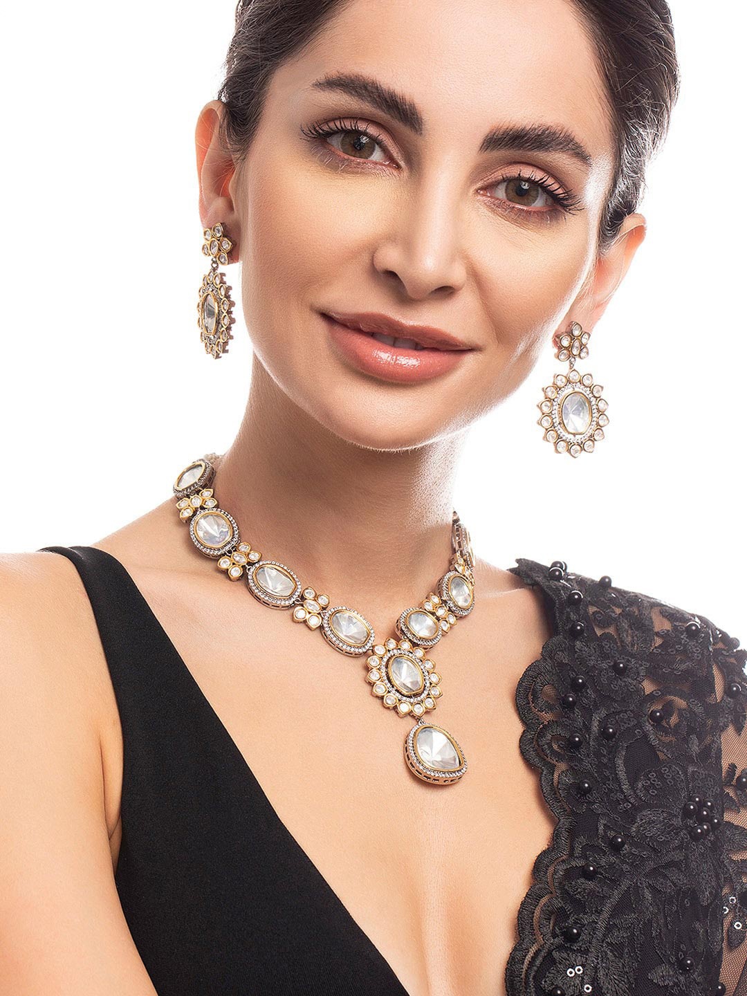 

Rubans Women Gold-Plated White Kundan-Studded Jewellery Set