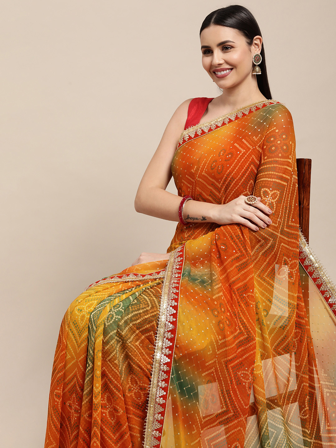 

VASTRANAND Orange & Green Bandhani Printed Sequined Embroidered Saree with Blouse