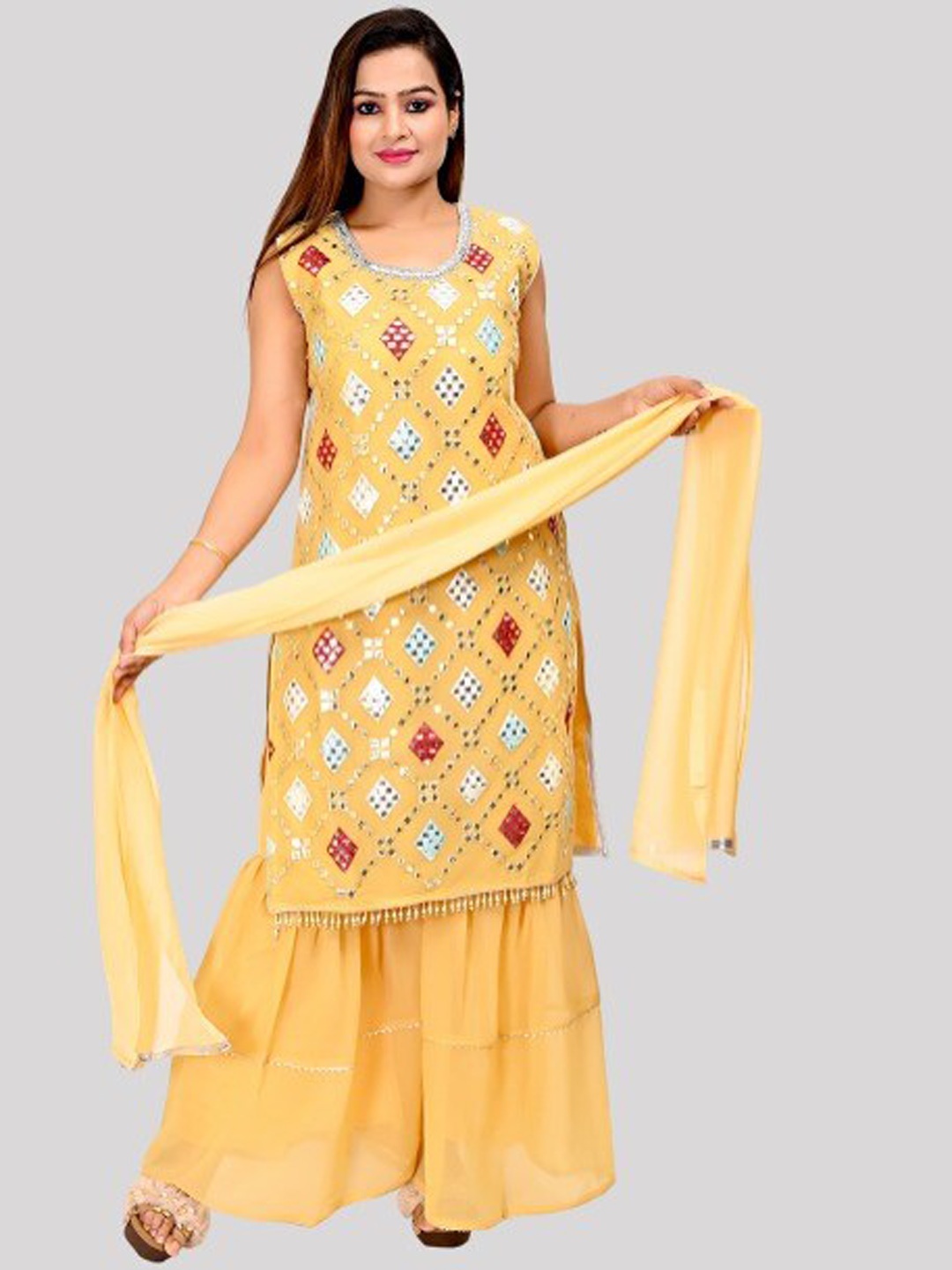 

FNOCKS Women Yellow Embroidered Layered Mirror Work Kurti with Sharara & With Dupatta