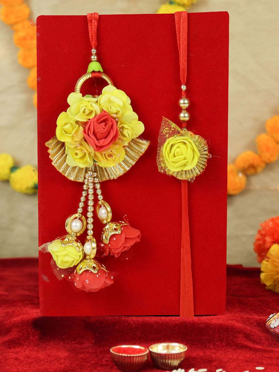 

TIED RIBBONS Yellow Pack Of 2 Bhaiya Bhabi Floral Rakhi With Roli Chawal & Card