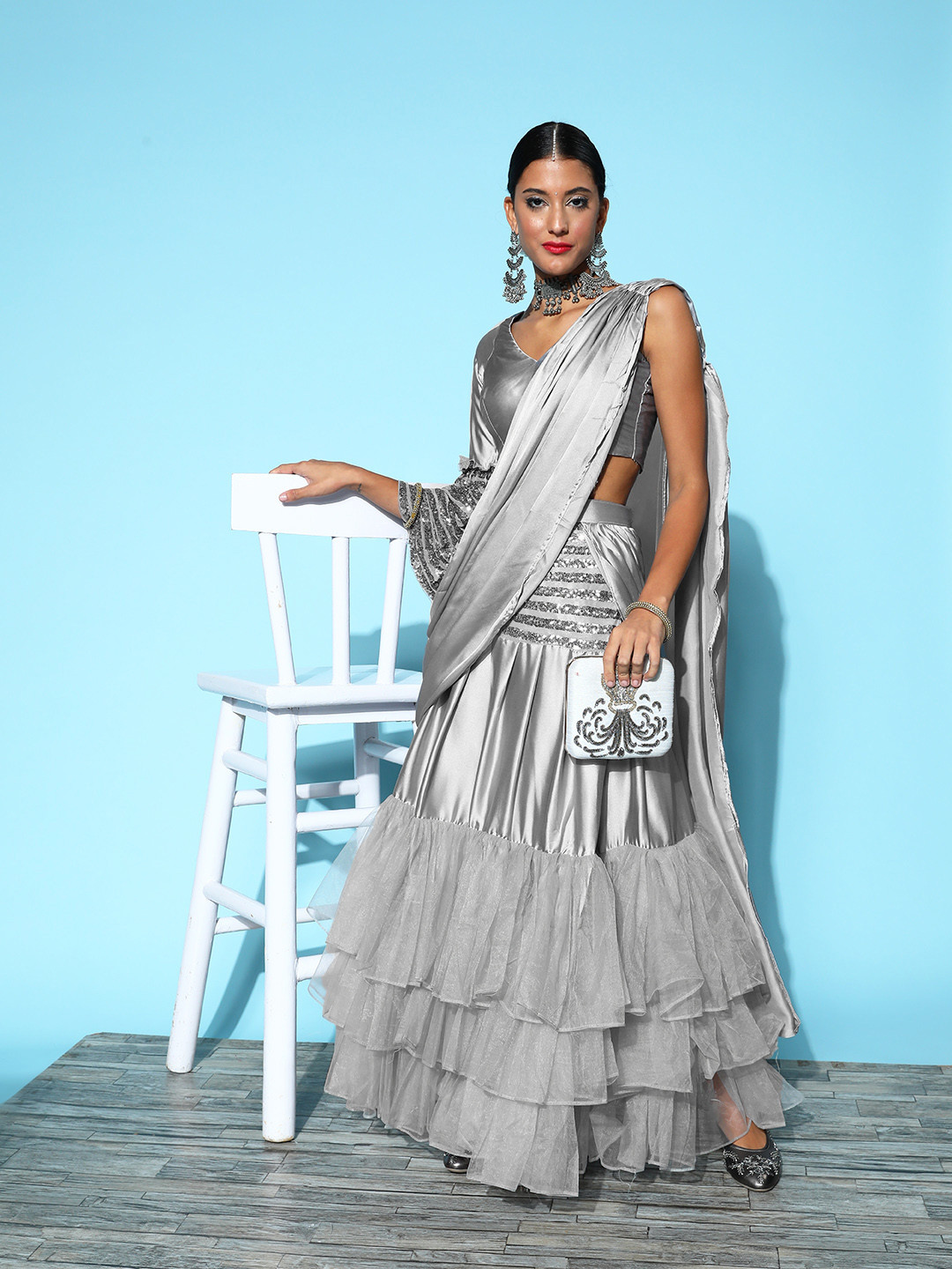 

Tikhi Imli Grey Ruffles Sequinned Net Ready to Wear Saree