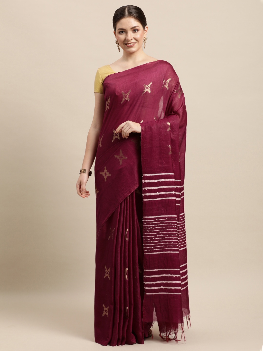 

swatika Purple & Gold-Toned Ethnic Motifs Zari Silk Blend Muga Saree