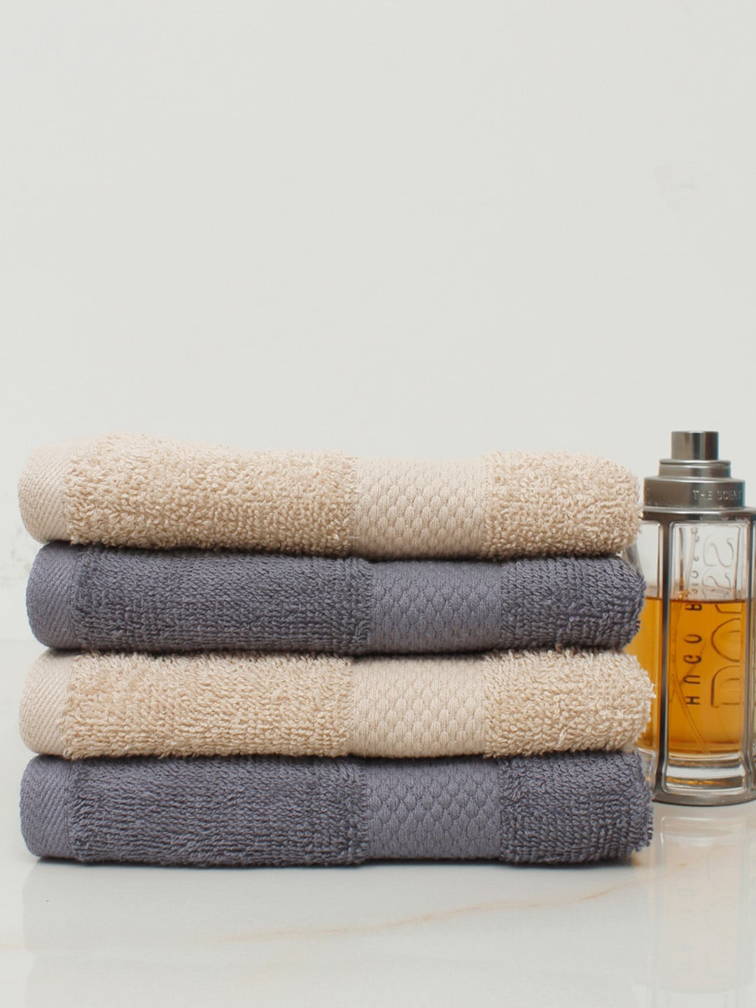 

AVI Living Set of 4 Solid 500 GSM Pure Cotton Hand Towels, Beige