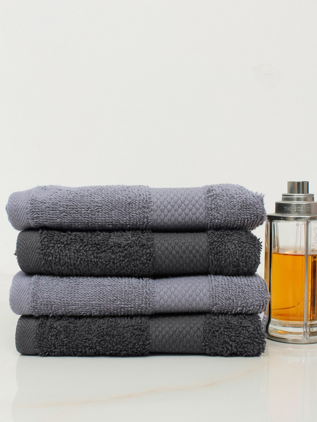 

AVI Living Set Of 4 Black & Charcoal Solid Pure Cotton 500 GSM Hand Towels