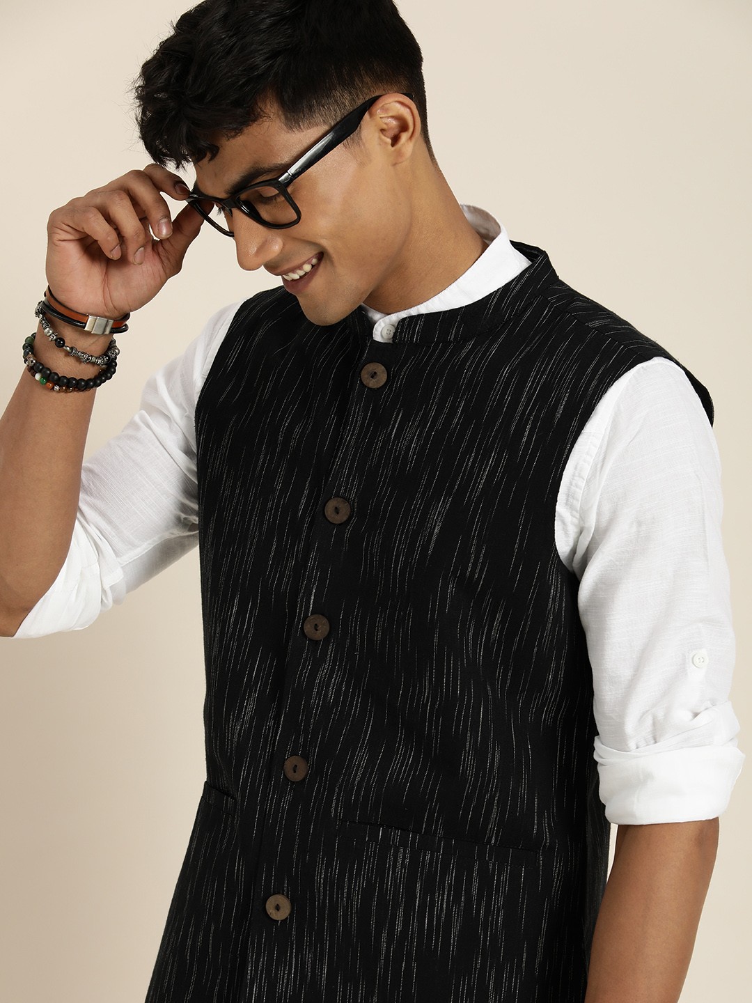 

Taavi Men Ikat Pure Cotton Mandarin Collar Nehru Jacket, Black