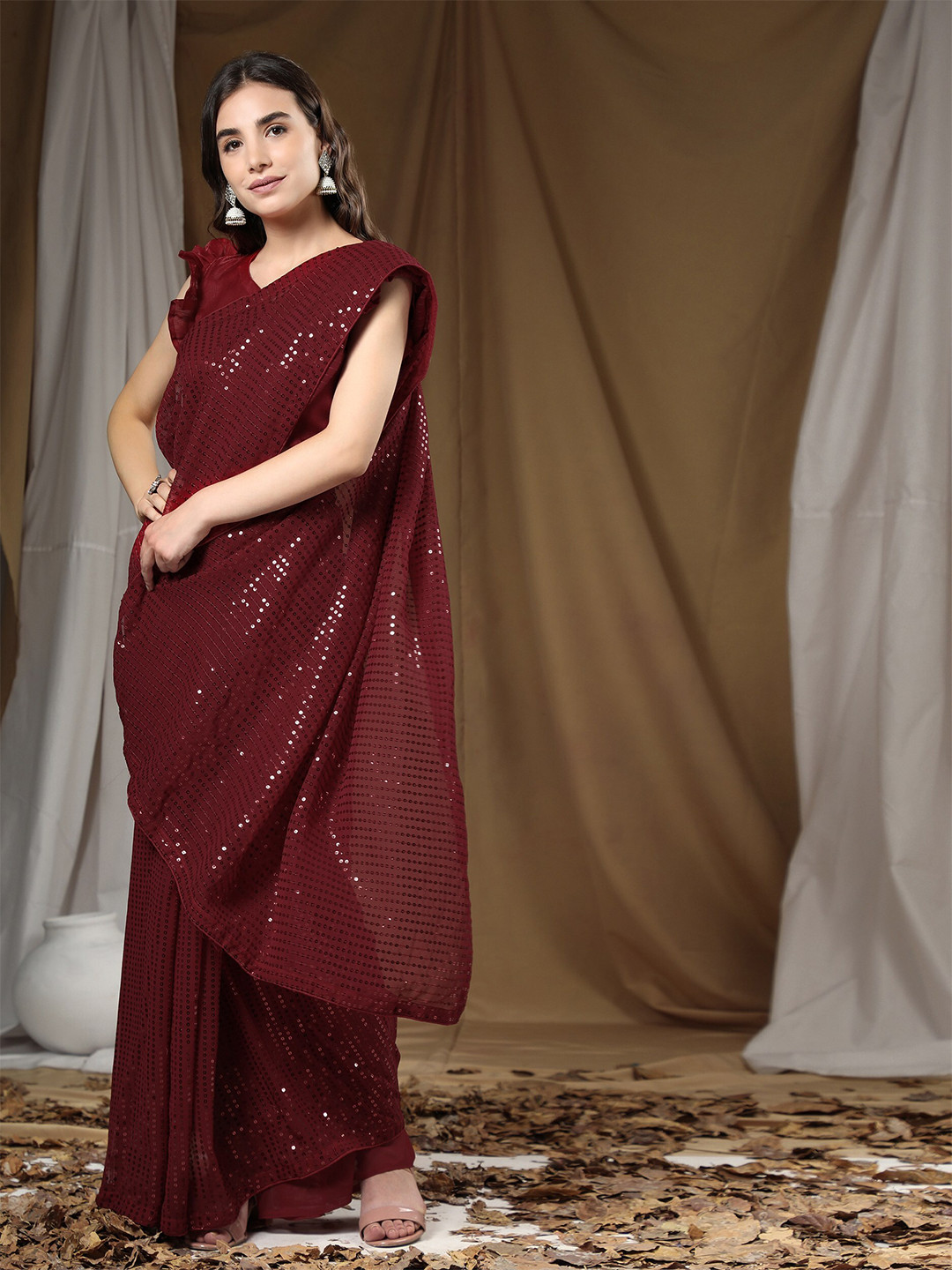 

ORUS Women Maroon Embellished Sequined Pure Georgette Saree