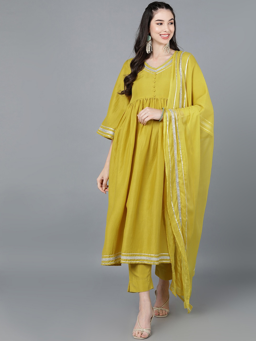 

AHIKA Women Yellow Embroidered Pleated Gotta Patti Kurta with Trousers & With Dupatta
