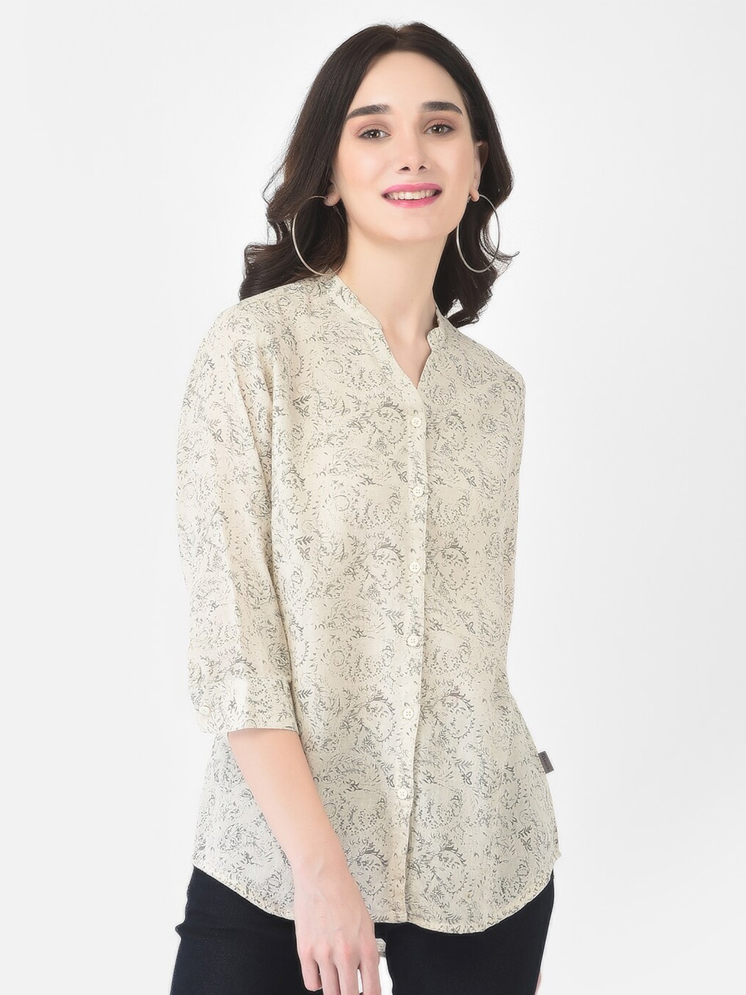 

Crimsoune Club Women Beige Floral Printed Casual Shirt