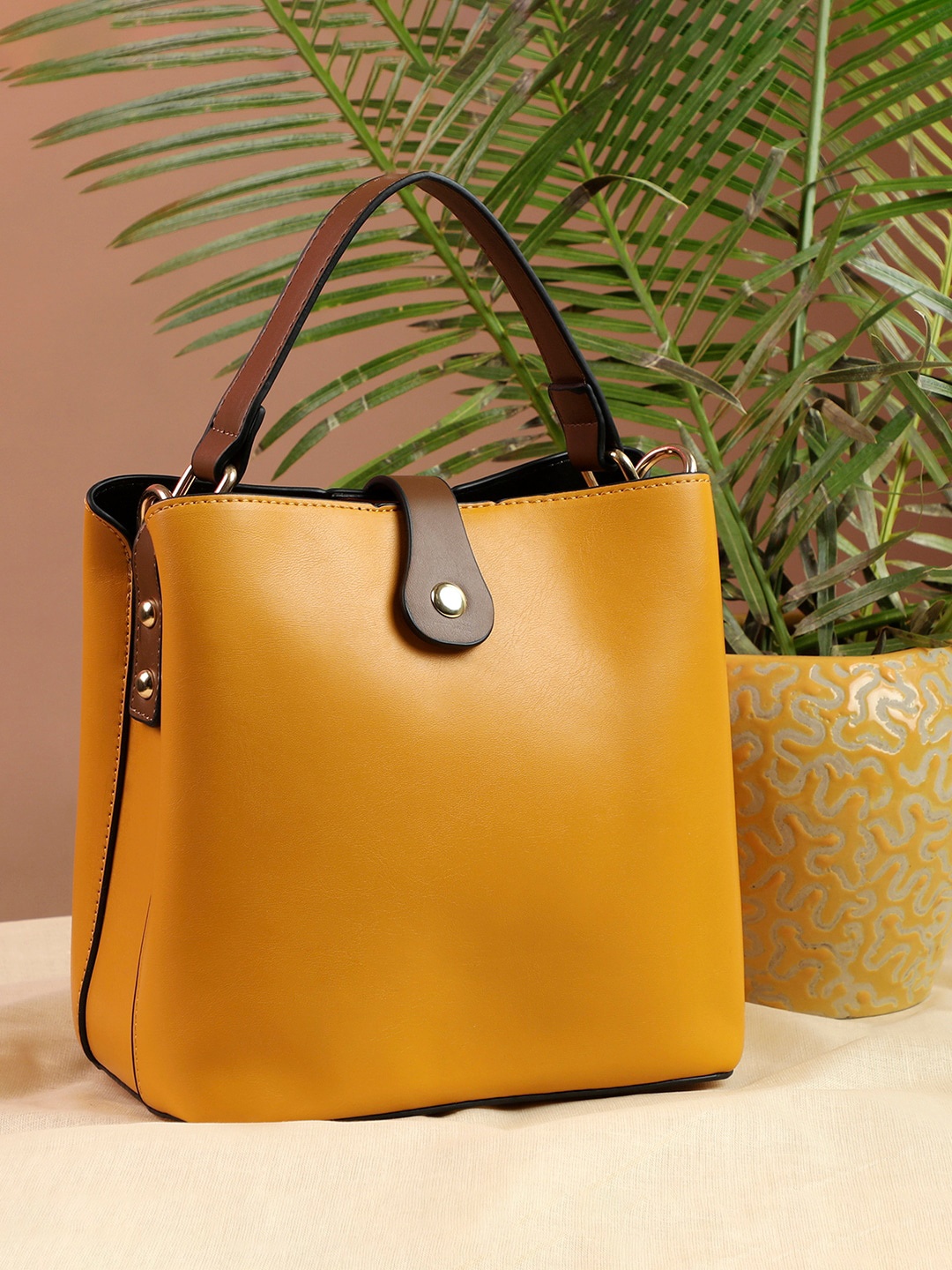 

HAUTE SAUCE by Campus Sutra Yellow PU Structured Handheld Bag with Applique