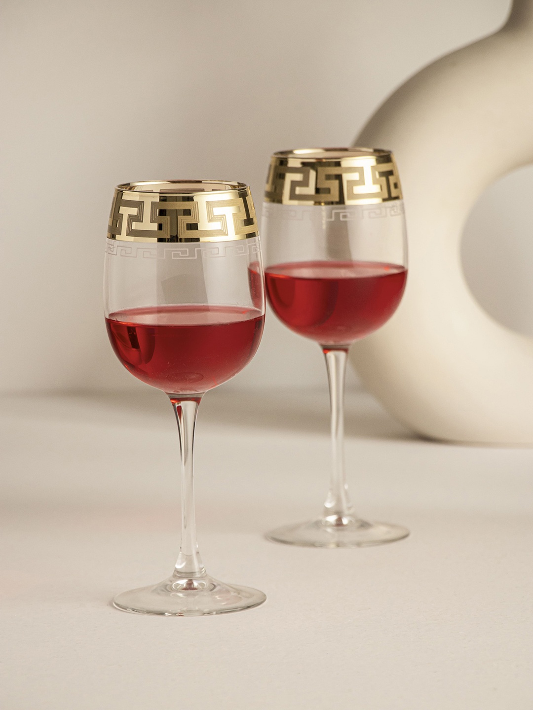 

Clasiko Set Of 2 Transparent Solid Wine Glass With Golden Rim