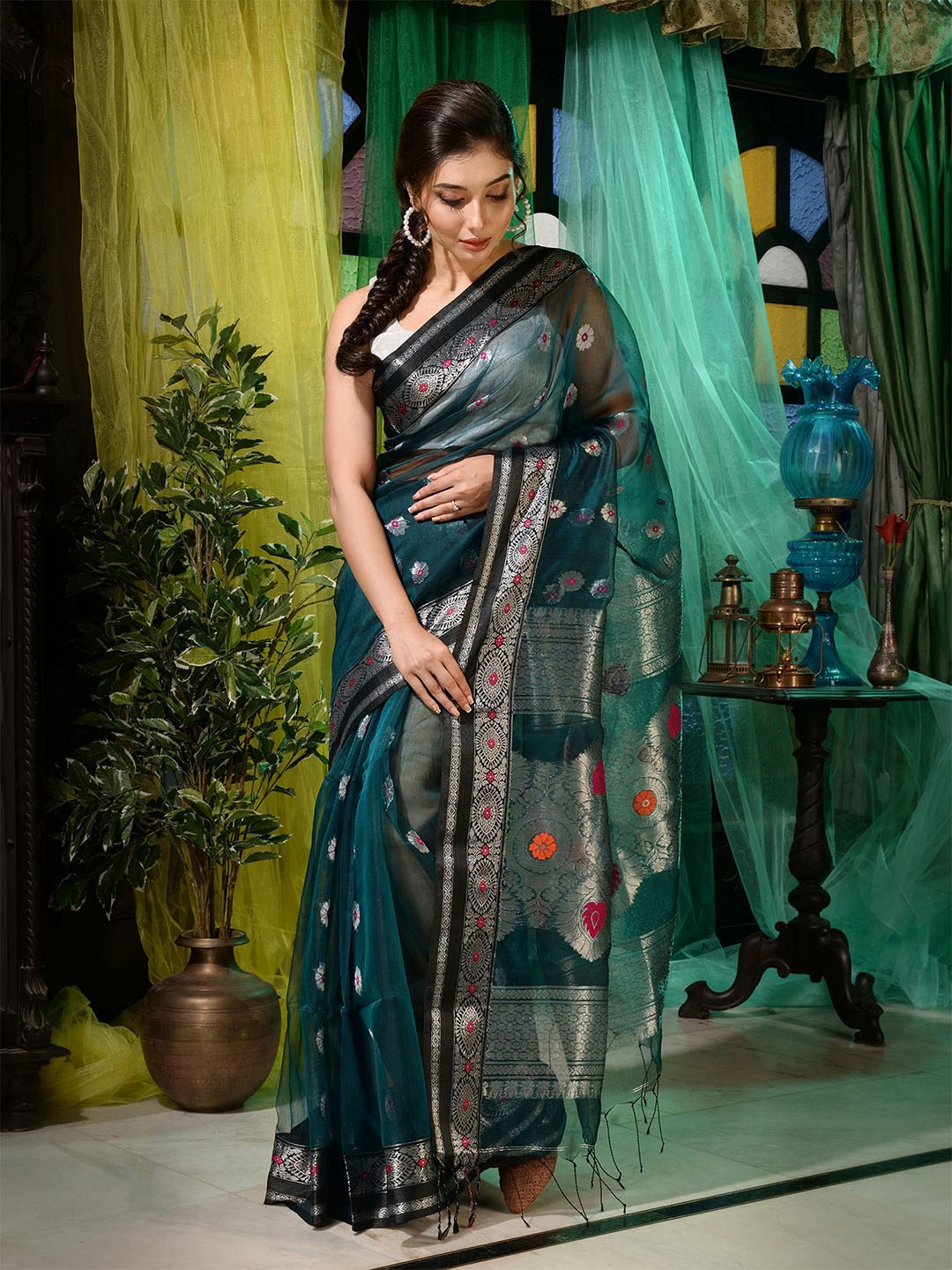 

Charukriti Teal & Silver-Toned Woven Design Zari Pure Silk Saree