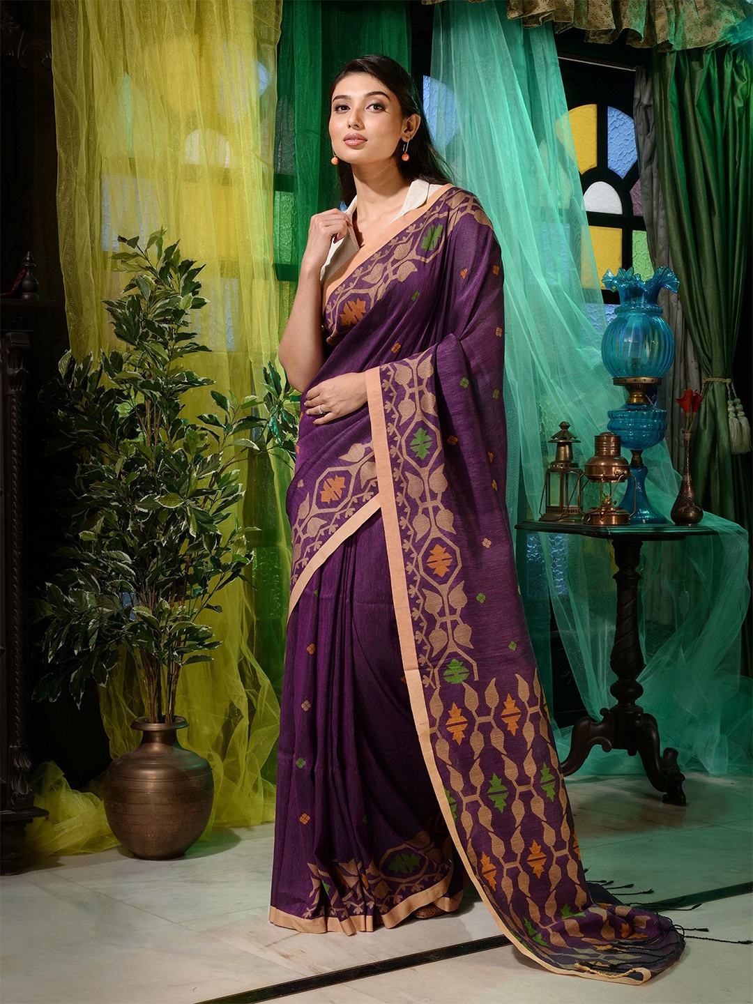 

Charukriti Purple & Green Woven Design Pure Linen Saree