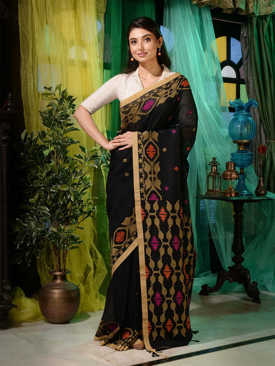 

Charukriti Black & Orange Woven Design Zari Pure Linen Saree