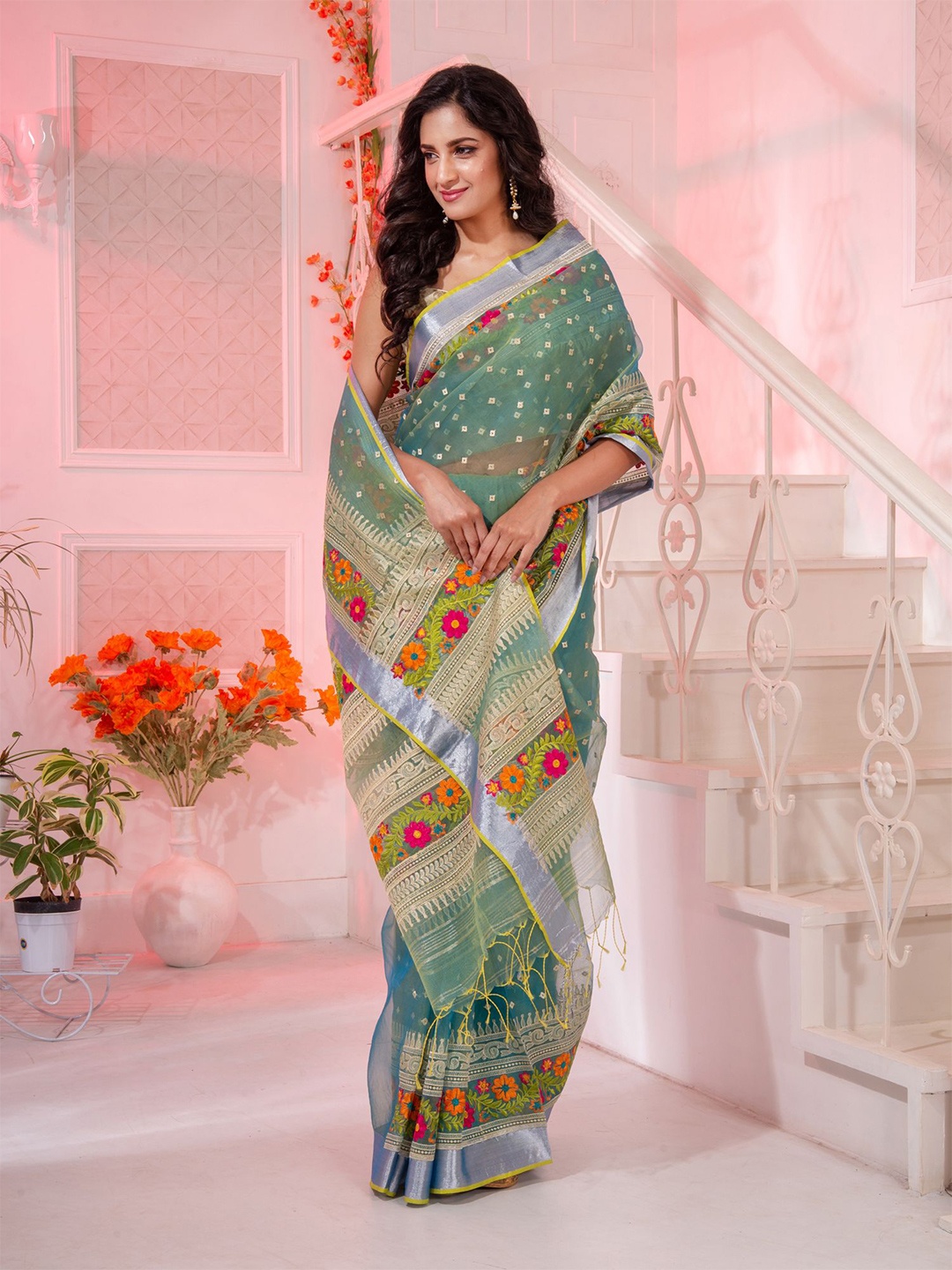 

Charukriti Blue & Pink Floral Pure Silk Saree