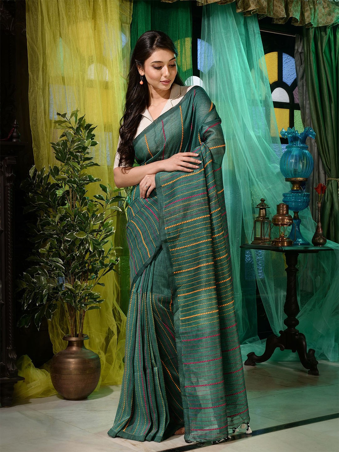 

Charukriti Green & Yellow Woven Design Pure Linen Saree