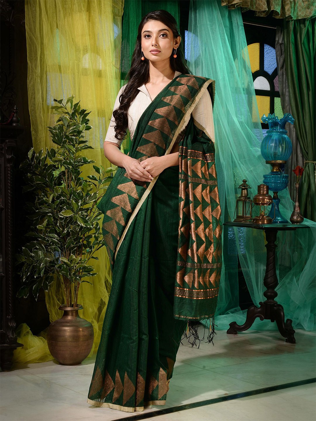 

Charukriti Green & Gold-Toned Woven Design Zari Pure Silk Saree