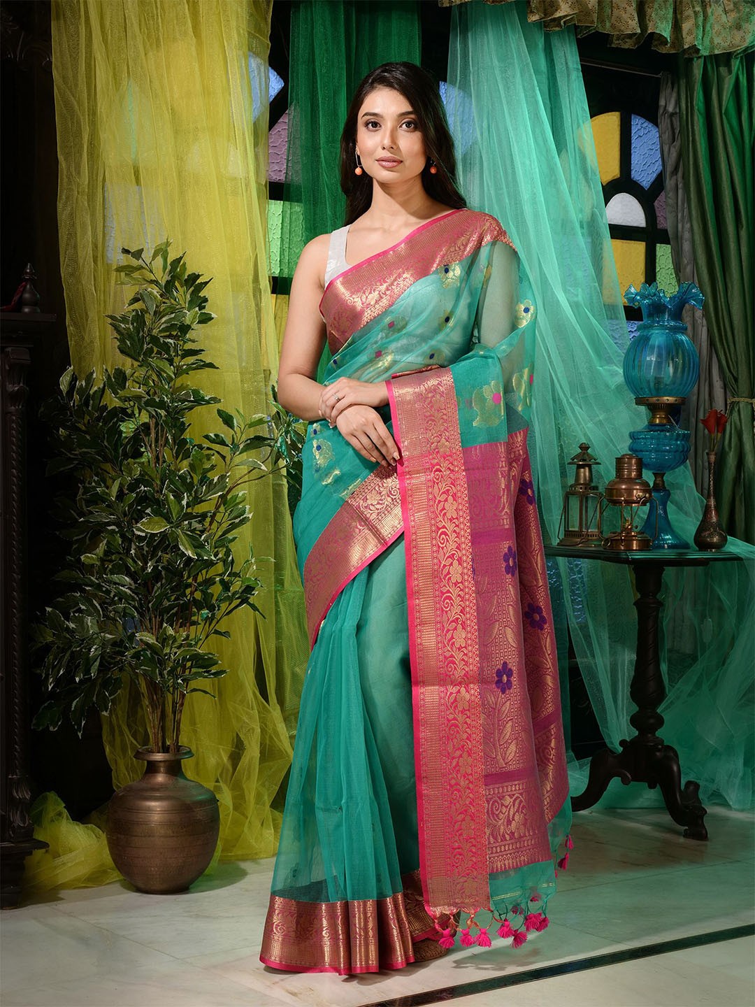 

Charukriti Green & Pink Woven Design Zari Pure Silk Saree with Unstitched Blouse Piece