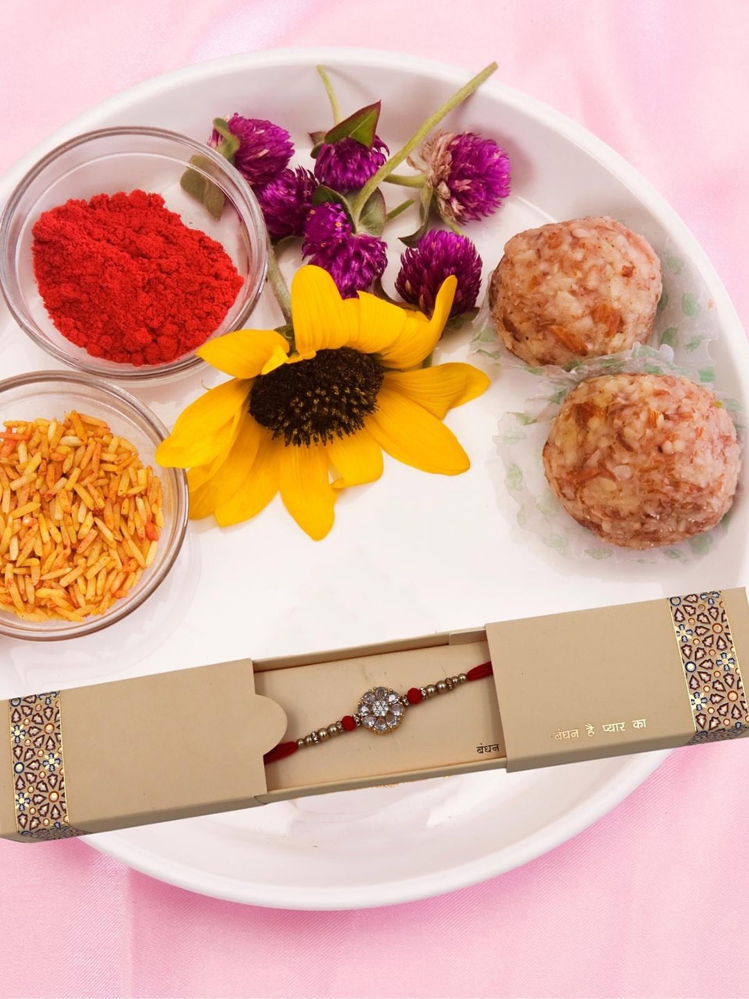 

YOUSTYLO Red & White Stone Studded & Beaded Rakhi with Roli, Chawal & Greeting Card