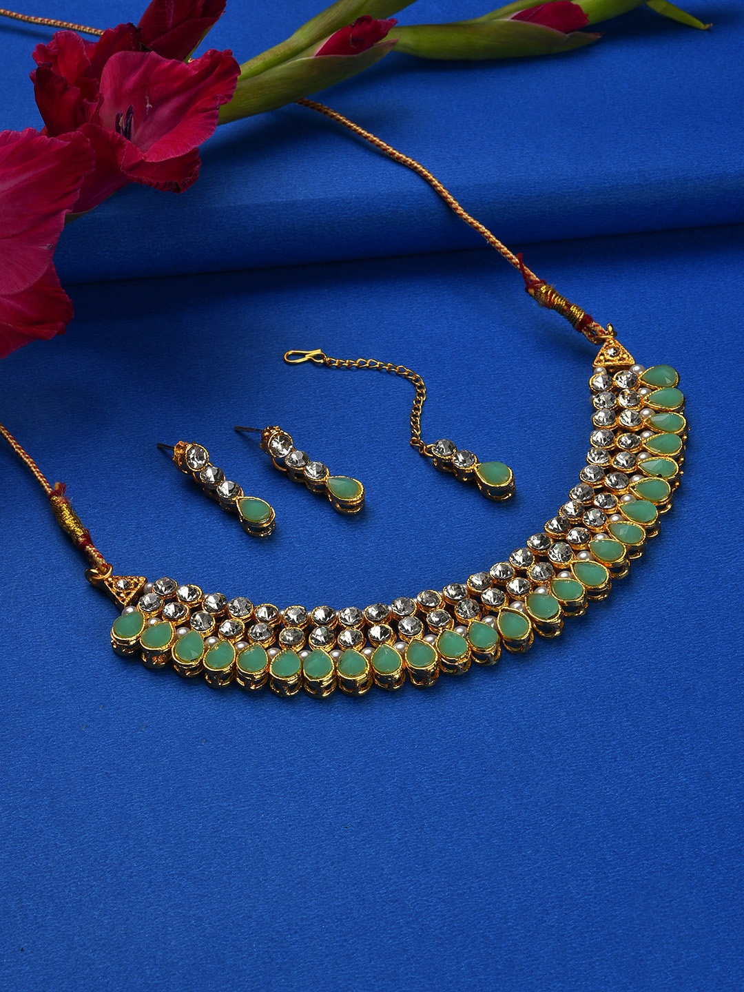 

SOHI Gold-Plated Green & White Stone Studded Jewellery Set