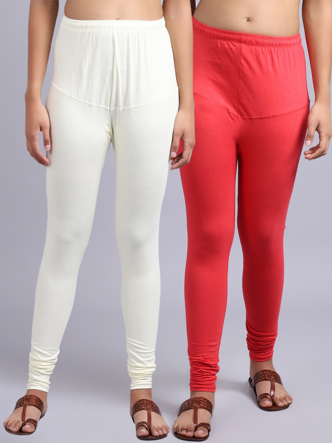 

Jinfo Women Pack Of 2 Orange & Off-White Solid Churidar Length Leggings