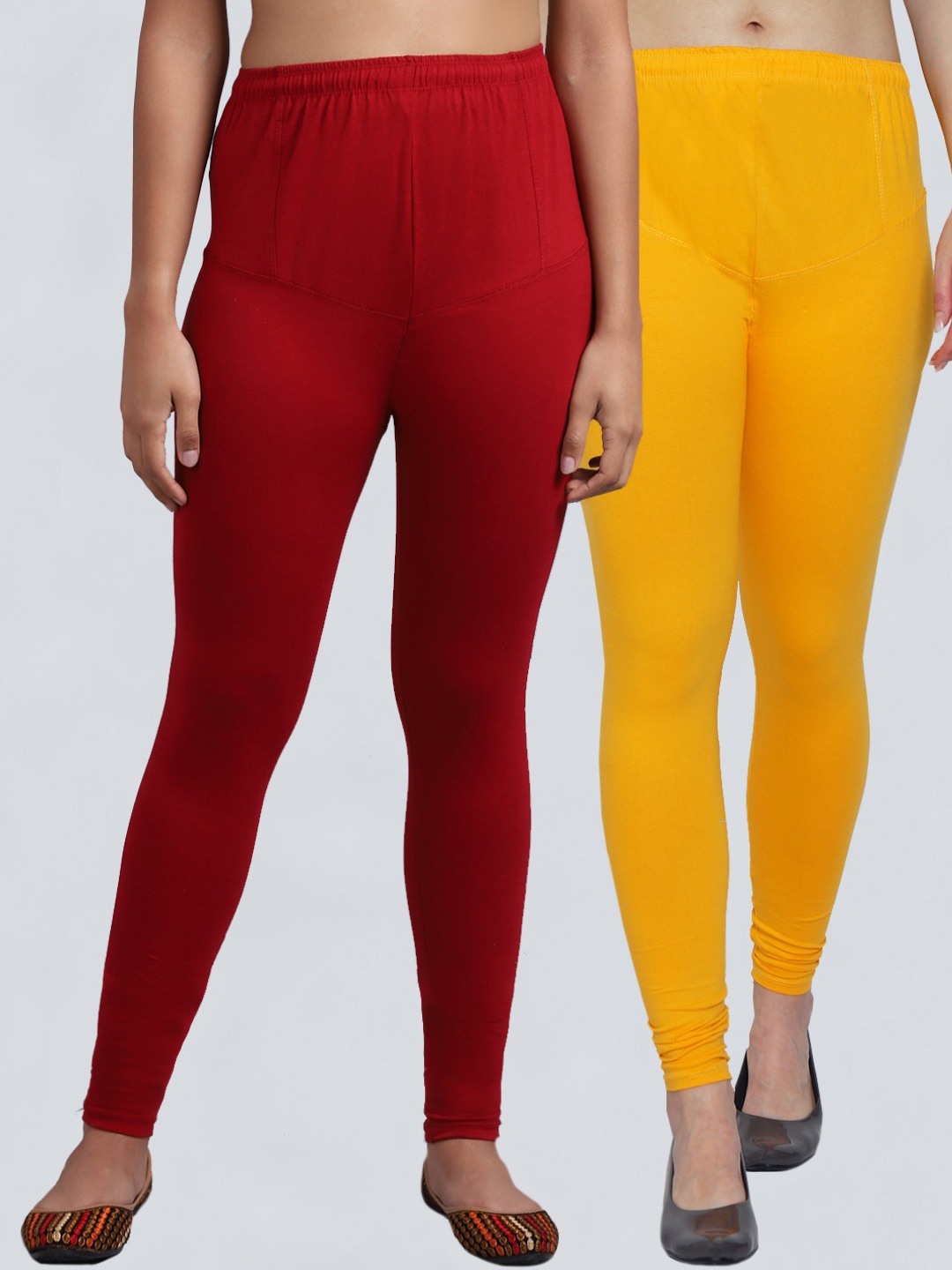 

Jinfo Women Pack of 2 Yellow & Maroon Solid Churidar Length Leggings