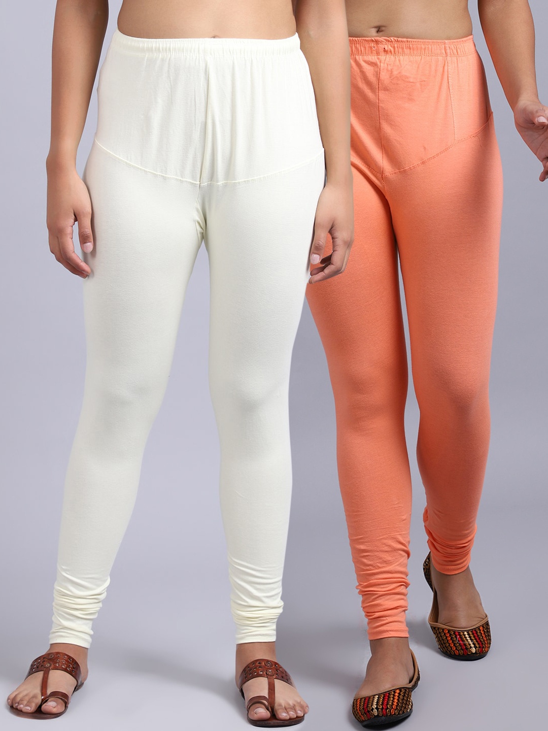 

GRACIT Women Pack Of 2 Solid Peach & Off White Churidar-Length Leggings