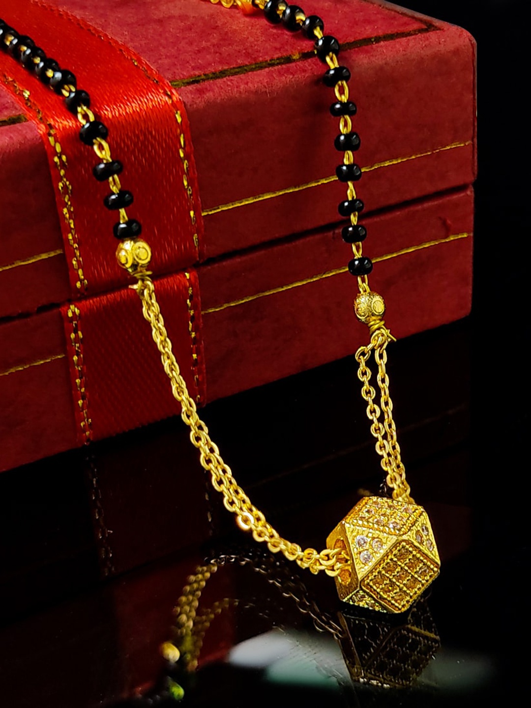 

Saizen Gold-Plated Gold-Toned Stone Studded & Beaded Mangalsutra