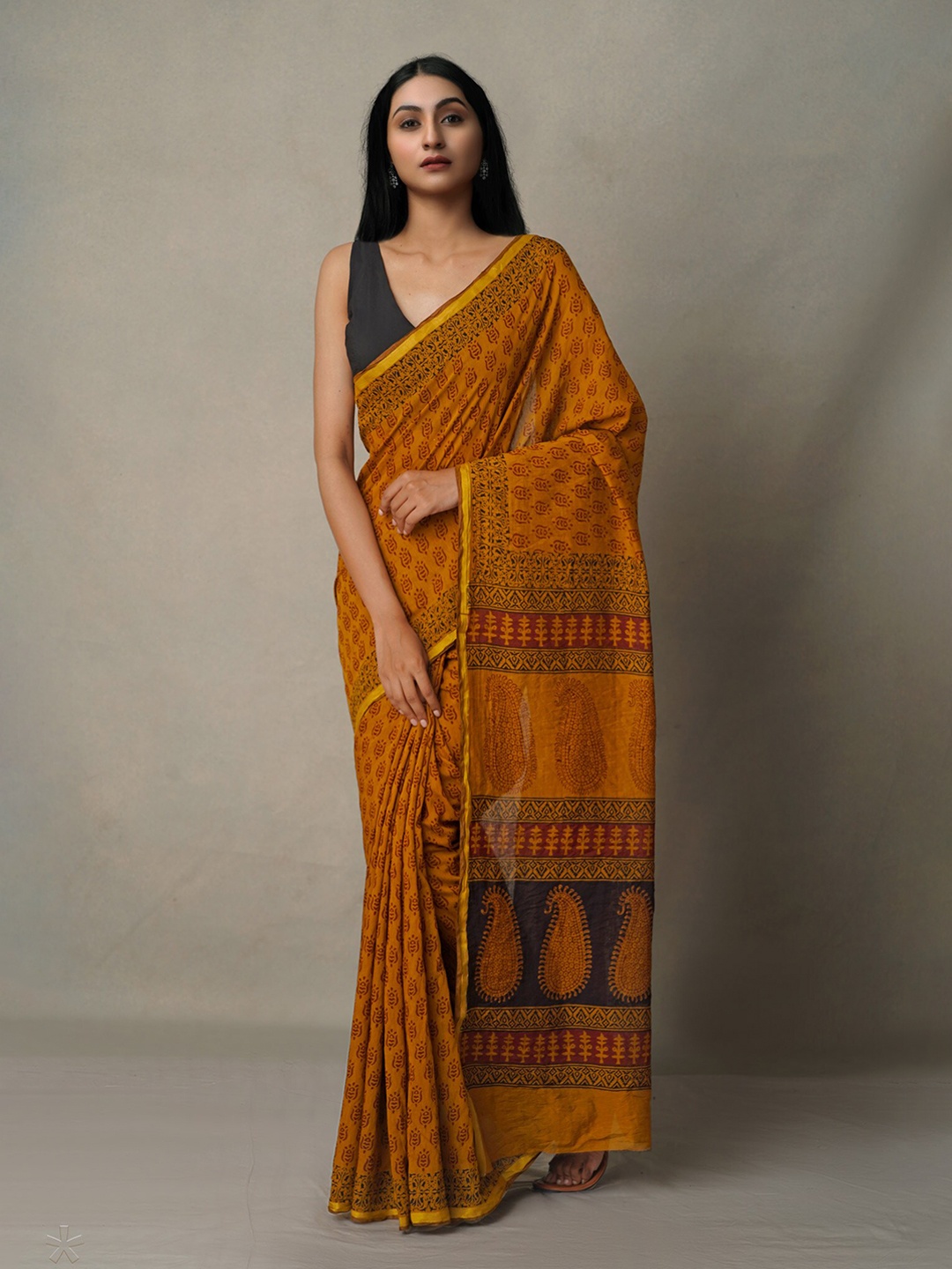 

Unnati Silks Orange & Black Bagh Zari Chanderi Saree