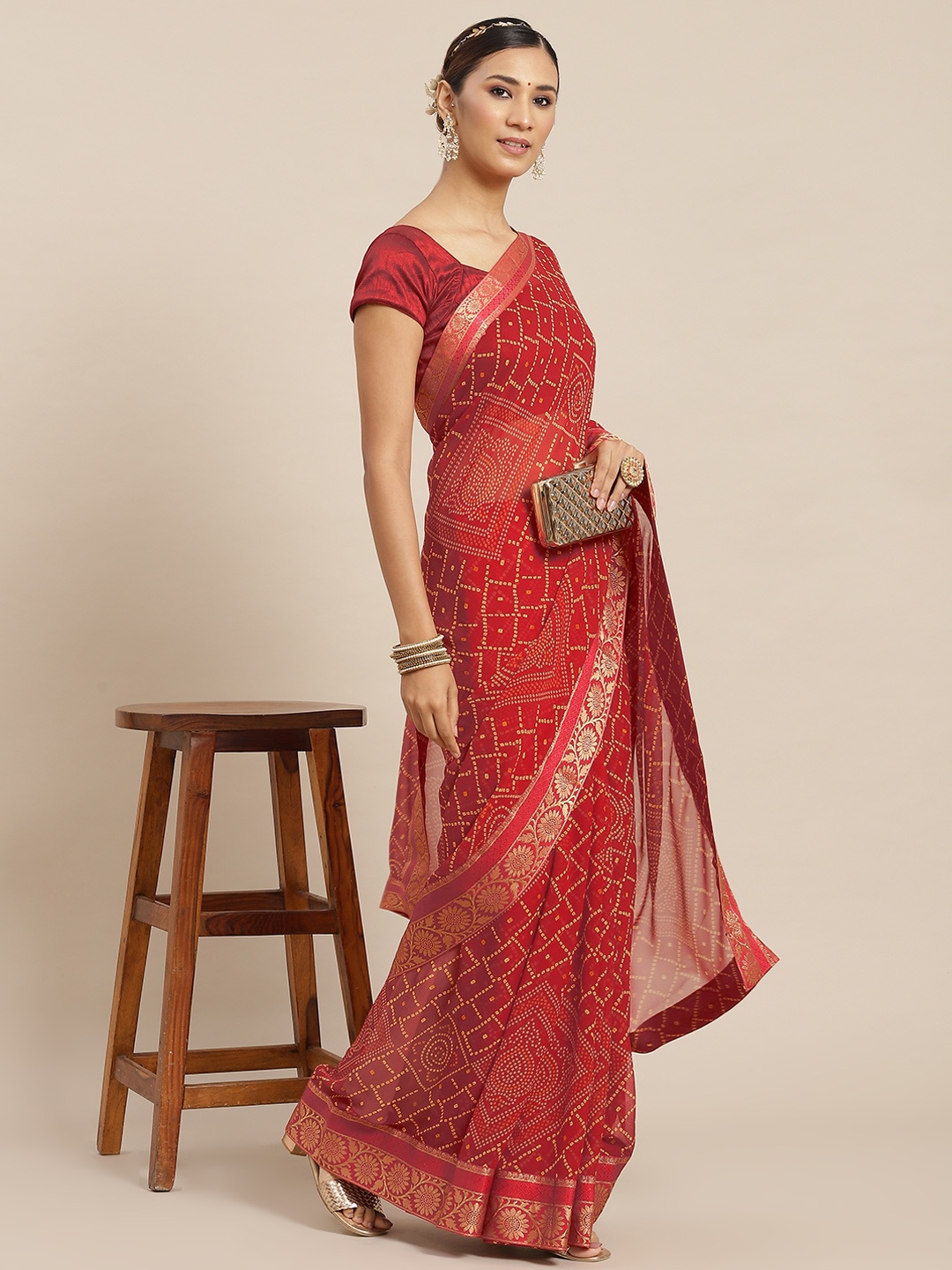 

Ishin Red Bandhani Zari Pure Georgette Saree