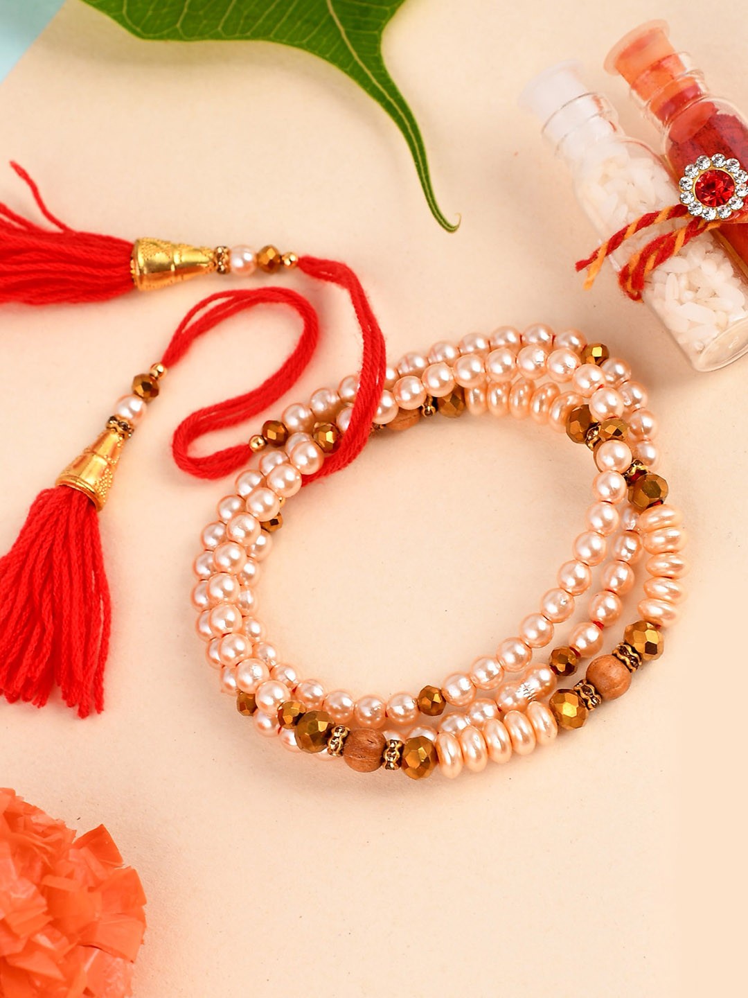 

Shoshaa Men Off White Pearl Beaded Rakhi