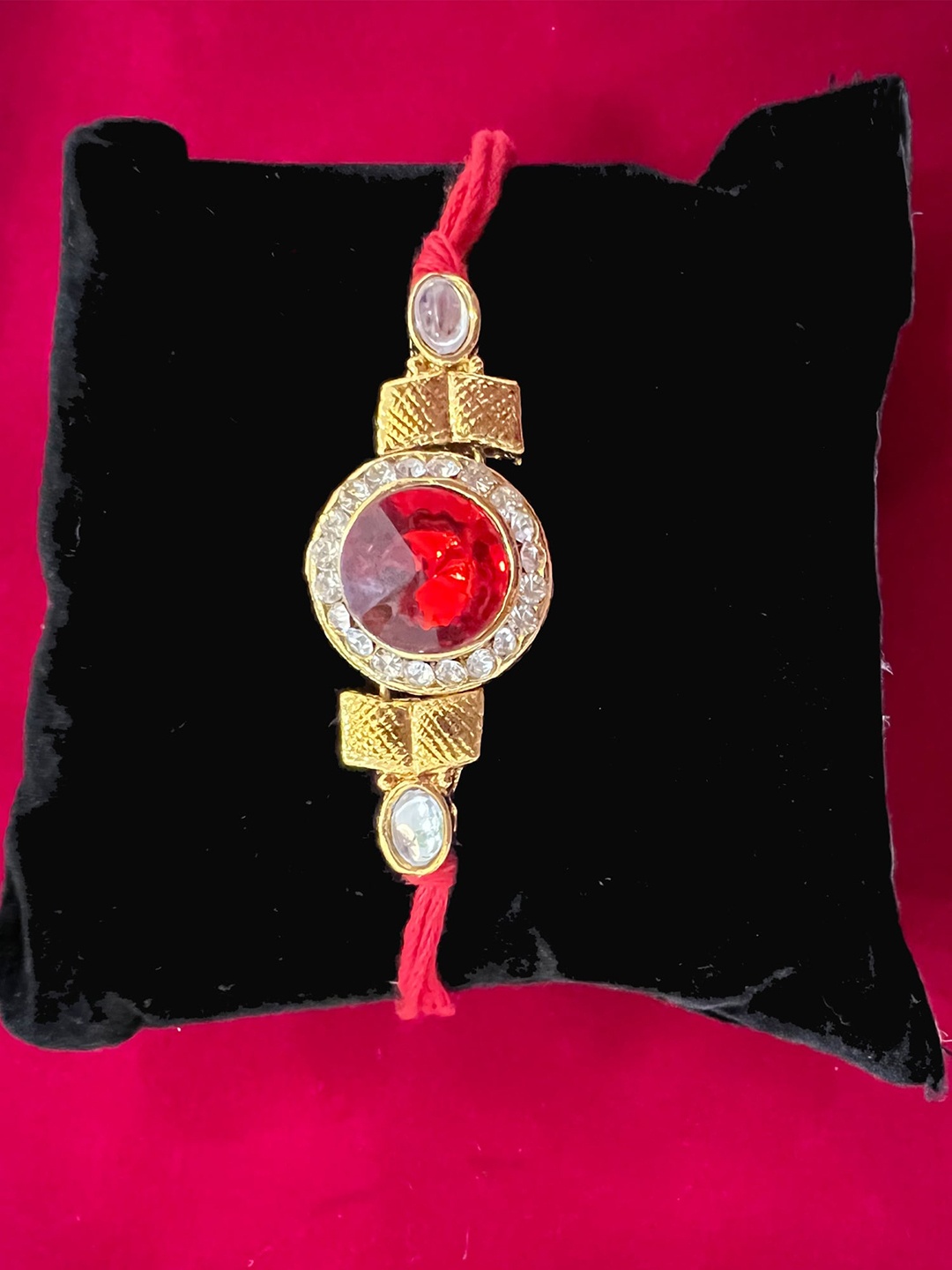 

Vembley Men Set Of 2 Gold-Toned & Red Kundan Studded Tie-Up Rakhi