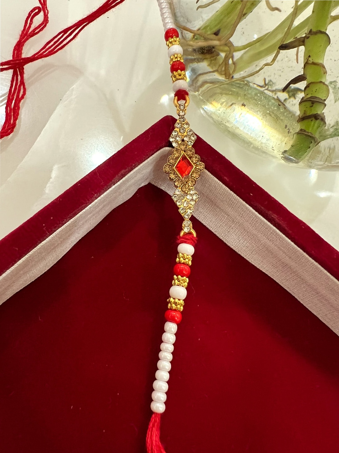 

Vembley Set Of 3 Gold-Toned & Red Stone-Studded & Beaded Rakhi