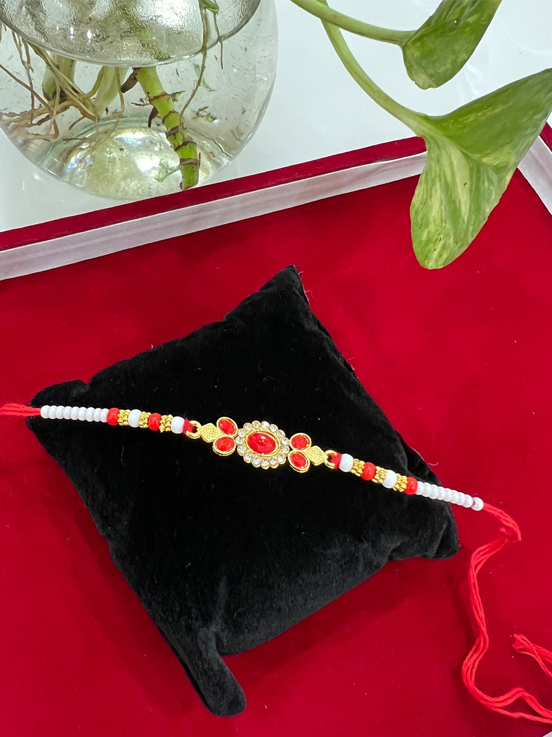 

Vembley Men Set of 4 Gold-Toned Red & White Pearl Thread Rakhi
