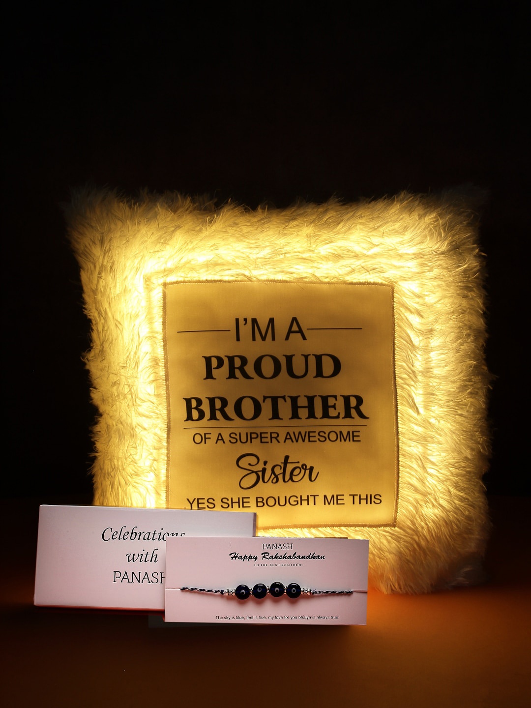 

PANASH Silver-Toned Brass Evil Eye Rakhi with LED Pillow Gift Set