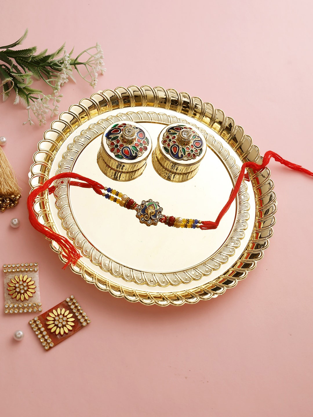 

Aapno Rajasthan Gold-Toned Rakhi with Handcrafted Thali & Two Small Decorative Boxes