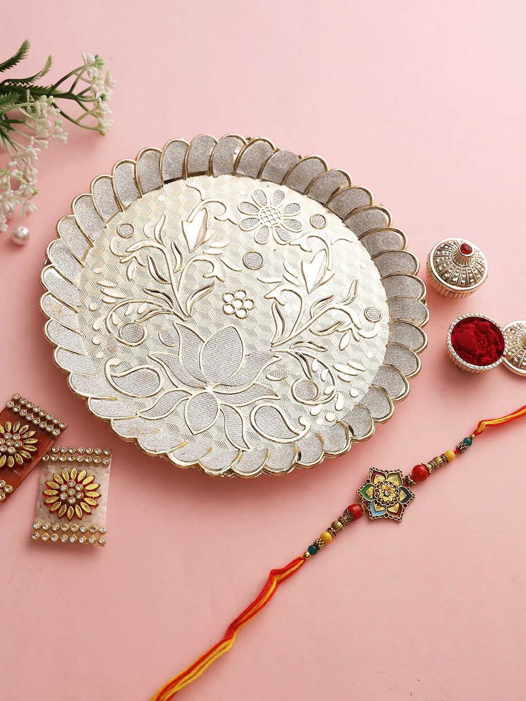 

Aapno Rajasthan Silver Toned Floral Rakhi Gift Combo Set