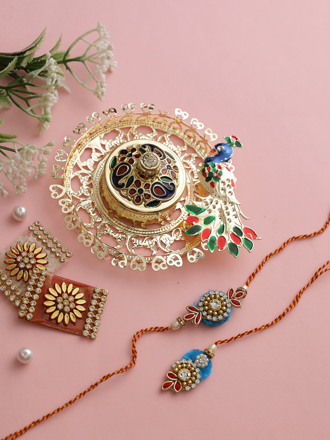 

Aapno Rajasthan Set Of 2 Gold-Toned & White Stone Studded Rakhi