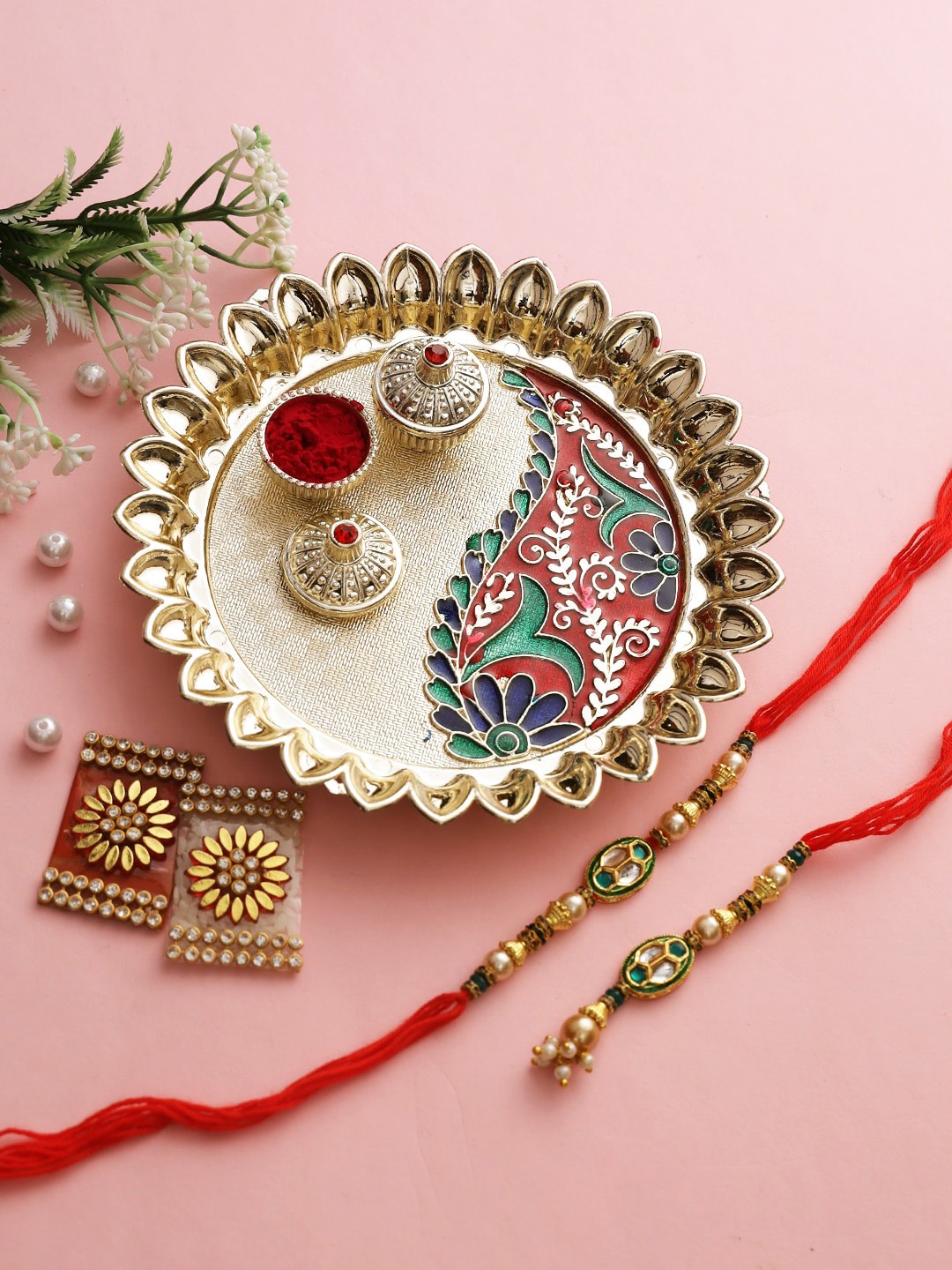 

Aapno Rajasthan Red & Gold-Toned Meenakari Bhaiya Bhabhi Rakhi Gift Set